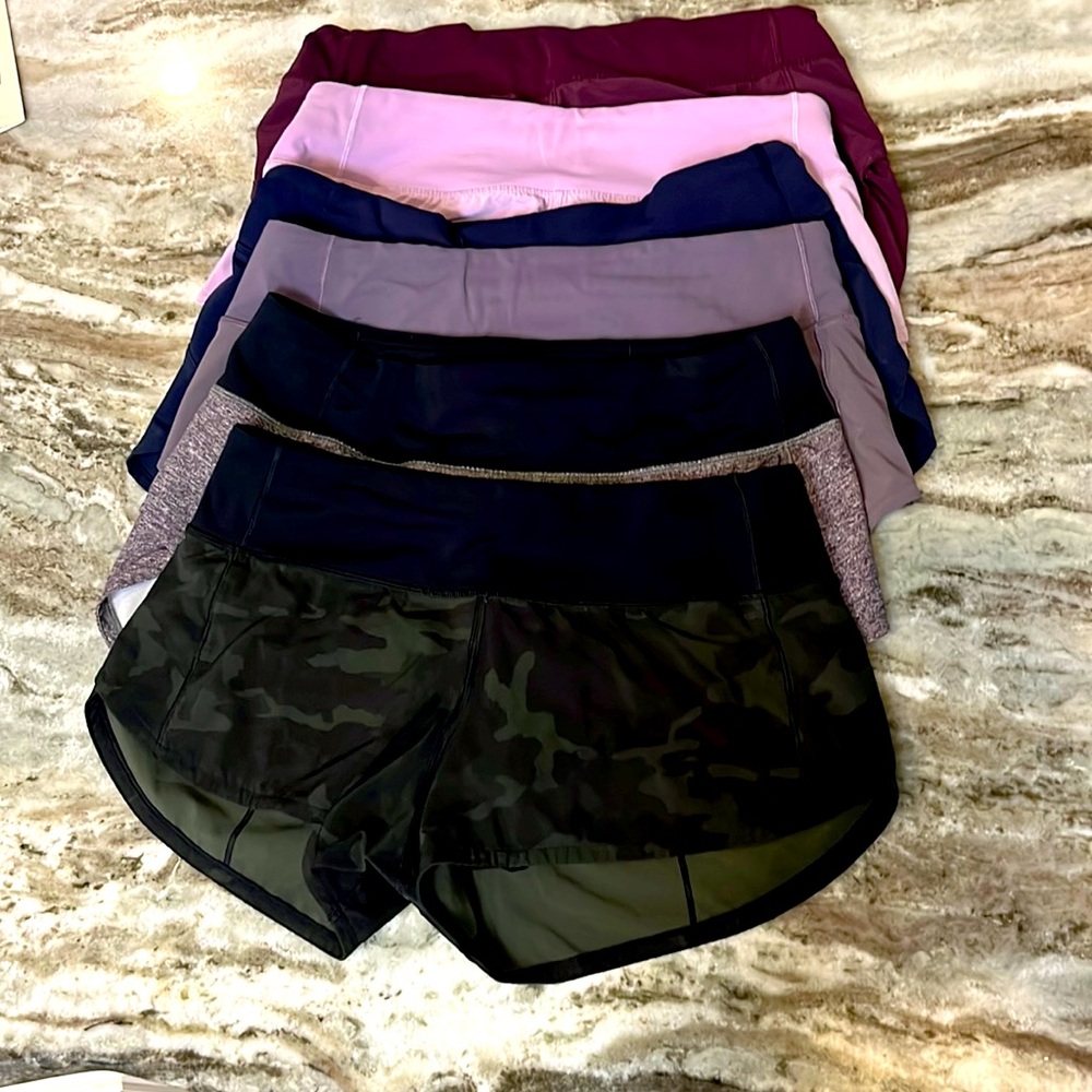 LOT OF 6 LULULEMON SPEED SHORTS USED BUT GOOD CONDITION. Size 4 regular